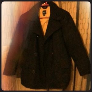 Black pea coat with tan lining, thick & warm.